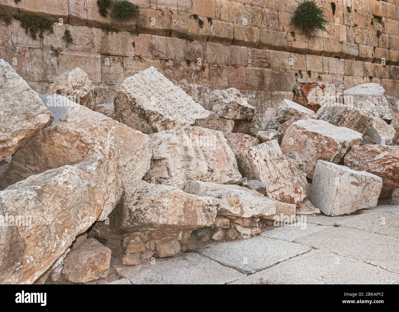 closeup of stones thrown from the second temple to the street below after the roman destruction of the temple in 70 CE at the western wall Stock Photo
