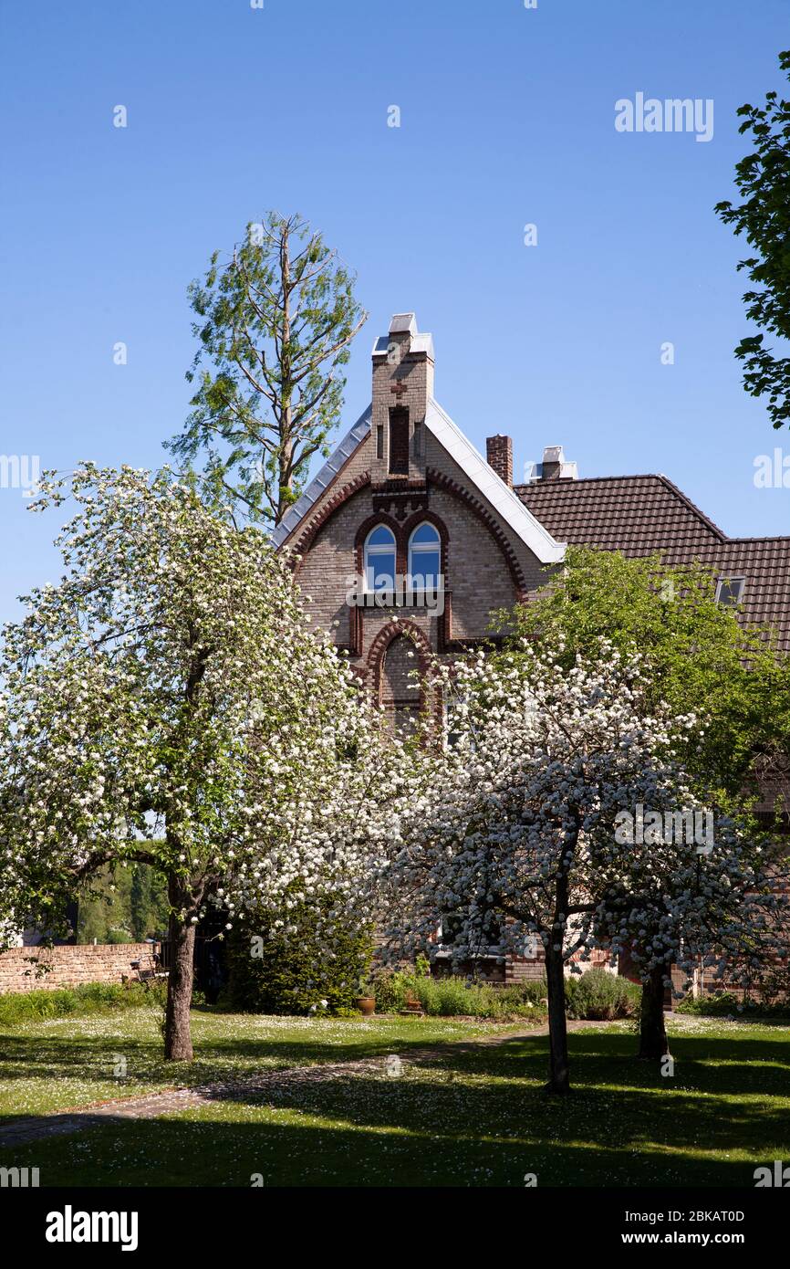 the neo-gothic rectory from 1870 of the church St. Maternus in the ...