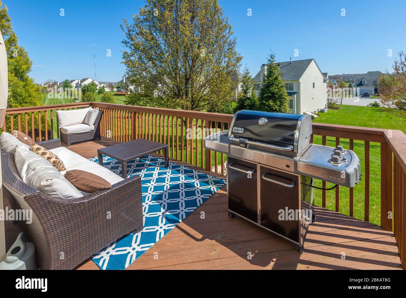 Backyard deck with patio furniture Stock Photo