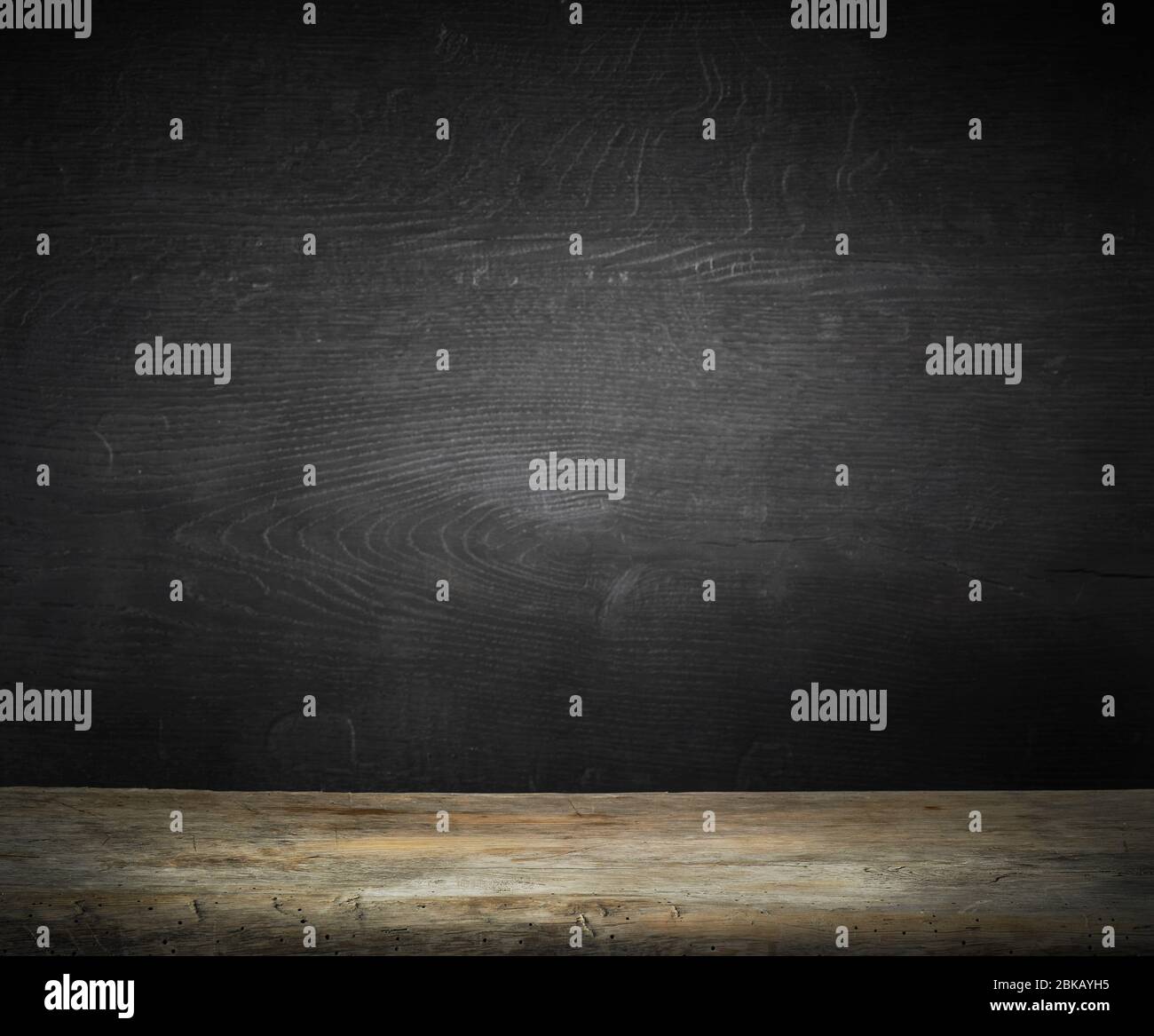 Old wood kitchen table top and dark wall background Stock Photo - Alamy