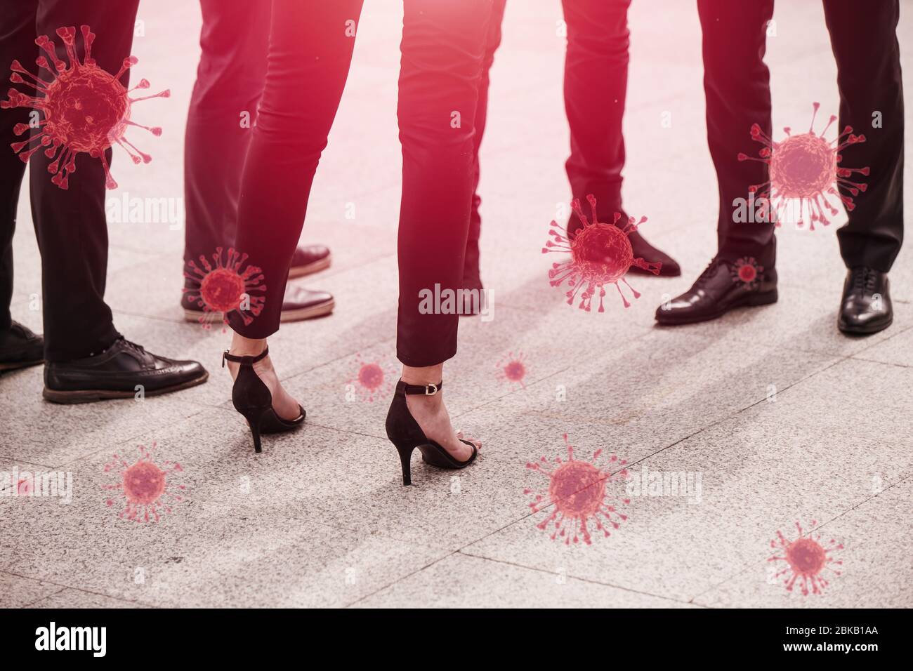 Closeup leg group of business people standing together risk to spreading of coronavirus virus infection. Stock Photo