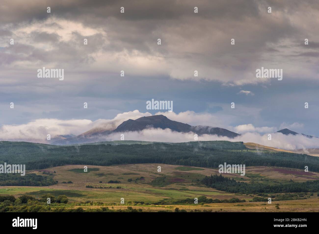 low mist over mountain by machrie bay, arran Stock Photo