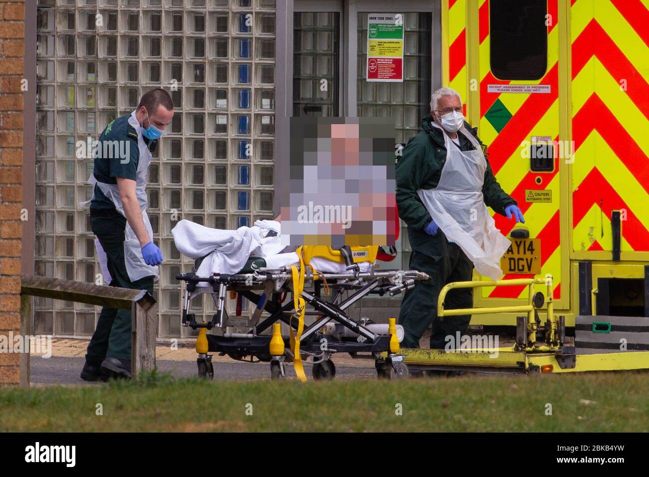 Picture dated April 29th shows ambulance crews taking in patients to the Covid-19 ward  at the Queen Elizabeth Hospital  in KingÕs Lynn in Norfolk on Wednesday afternoon.  Ambulance drivers were today (Wed) seen delivering patients with suspected coronavirus into the hospital close to the QueenÕs Norfolk estate C where Prince William and Kate are currently staying with their children.  NHS staff were seen pushing the patients on trollies into the Queen Elizabeth Hospital (QEH) in KingÕs Lynn, which is just six miles from Sandringham, where the Royal couple are currently living at Anmer Hall wi Stock Photo
