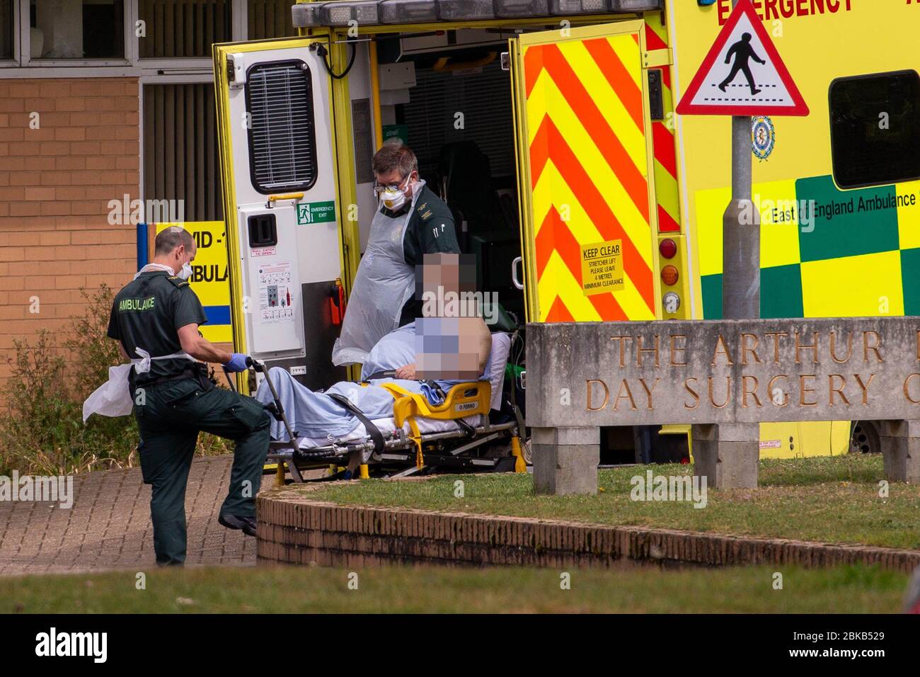 Picture dated April 29th shows ambulance crews taking in patients to the Covid-19 ward  at the Queen Elizabeth Hospital  in KingÕs Lynn in Norfolk on Wednesday afternoon.  Ambulance drivers were today (Wed) seen delivering patients with suspected coronavirus into the hospital close to the QueenÕs Norfolk estate C where Prince William and Kate are currently staying with their children.  NHS staff were seen pushing the patients on trollies into the Queen Elizabeth Hospital (QEH) in KingÕs Lynn, which is just six miles from Sandringham, where the Royal couple are currently living at Anmer Hall wi Stock Photo