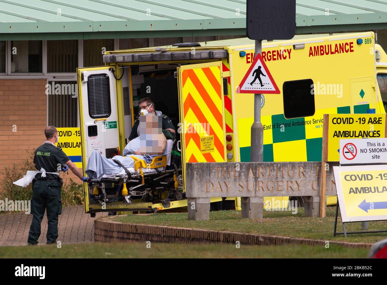 Picture dated April 29th shows ambulance crews taking in patients to the Covid-19 ward  at the Queen Elizabeth Hospital  in KingÕs Lynn in Norfolk on Wednesday afternoon.  Ambulance drivers were today (Wed) seen delivering patients with suspected coronavirus into the hospital close to the QueenÕs Norfolk estate C where Prince William and Kate are currently staying with their children.  NHS staff were seen pushing the patients on trollies into the Queen Elizabeth Hospital (QEH) in KingÕs Lynn, which is just six miles from Sandringham, where the Royal couple are currently living at Anmer Hall wi Stock Photo