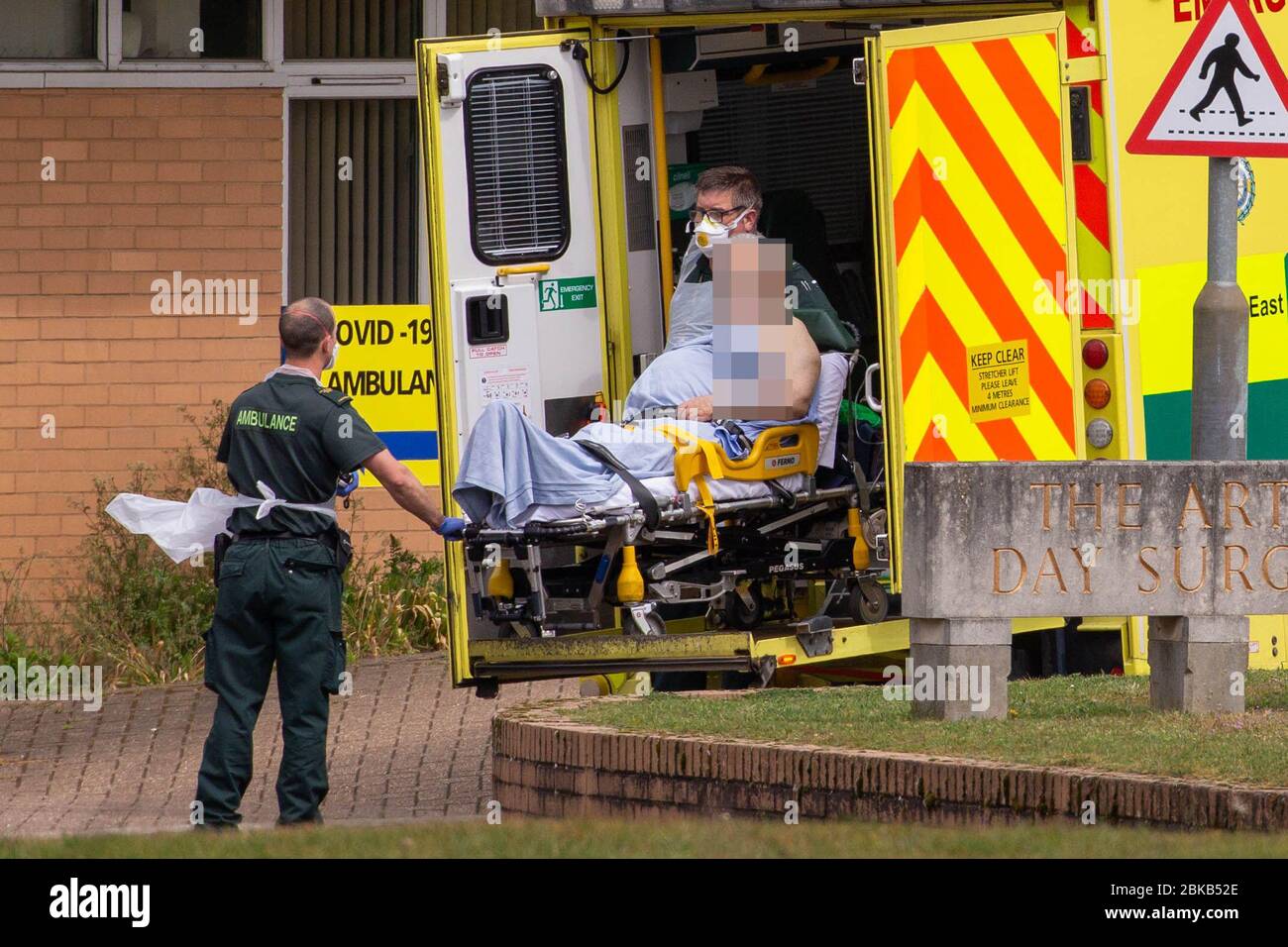 Picture dated April 29th shows ambulance crews taking in patients to the Covid-19 ward  at the Queen Elizabeth Hospital  in KingÕs Lynn in Norfolk on Wednesday afternoon.  Ambulance drivers were today (Wed) seen delivering patients with suspected coronavirus into the hospital close to the QueenÕs Norfolk estate C where Prince William and Kate are currently staying with their children.  NHS staff were seen pushing the patients on trollies into the Queen Elizabeth Hospital (QEH) in KingÕs Lynn, which is just six miles from Sandringham, where the Royal couple are currently living at Anmer Hall wi Stock Photo
