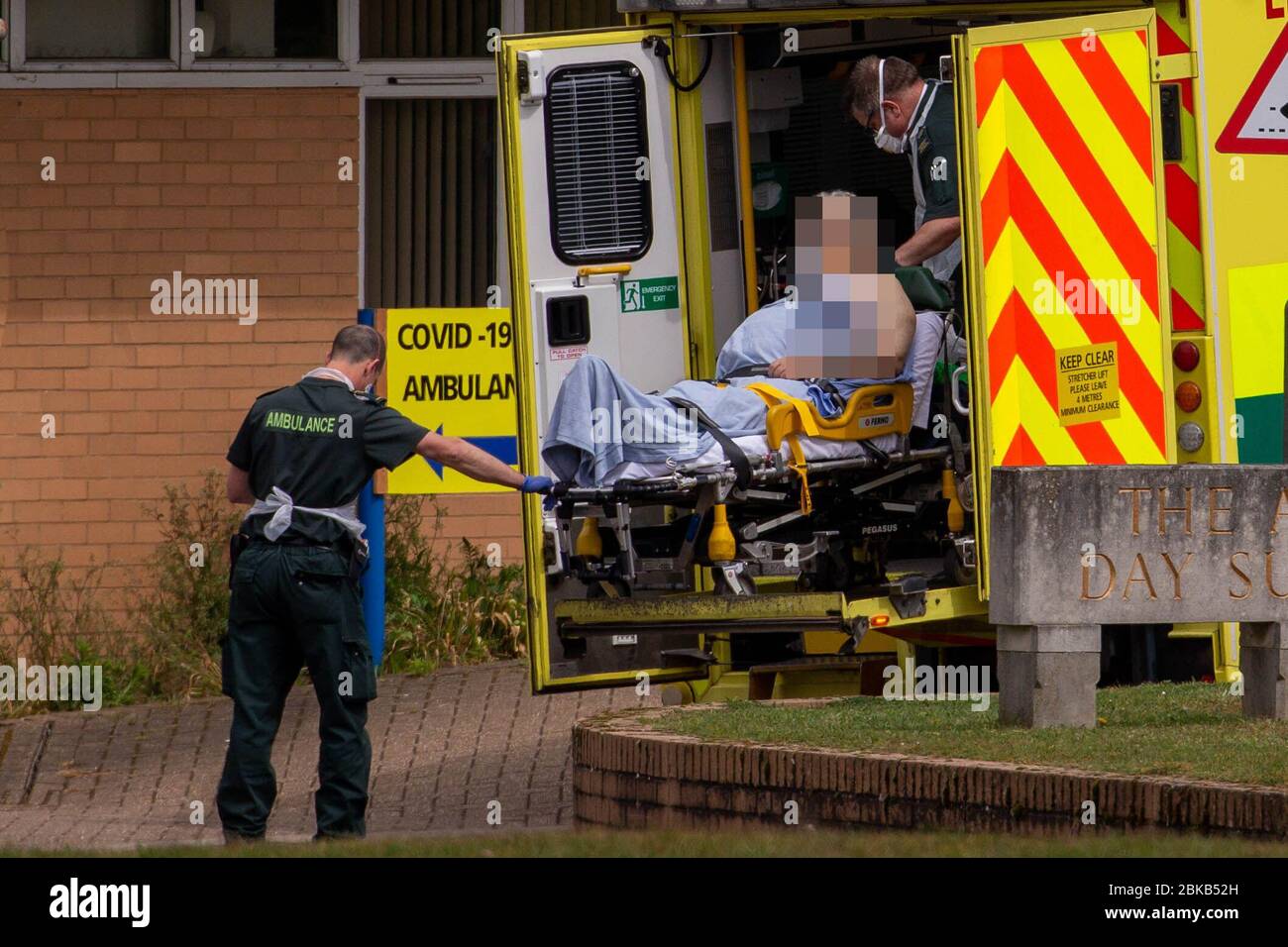 Picture dated April 29th shows ambulance crews taking in patients to the Covid-19 ward  at the Queen Elizabeth Hospital  in KingÕs Lynn in Norfolk on Wednesday afternoon.  Ambulance drivers were today (Wed) seen delivering patients with suspected coronavirus into the hospital close to the QueenÕs Norfolk estate C where Prince William and Kate are currently staying with their children.  NHS staff were seen pushing the patients on trollies into the Queen Elizabeth Hospital (QEH) in KingÕs Lynn, which is just six miles from Sandringham, where the Royal couple are currently living at Anmer Hall wi Stock Photo