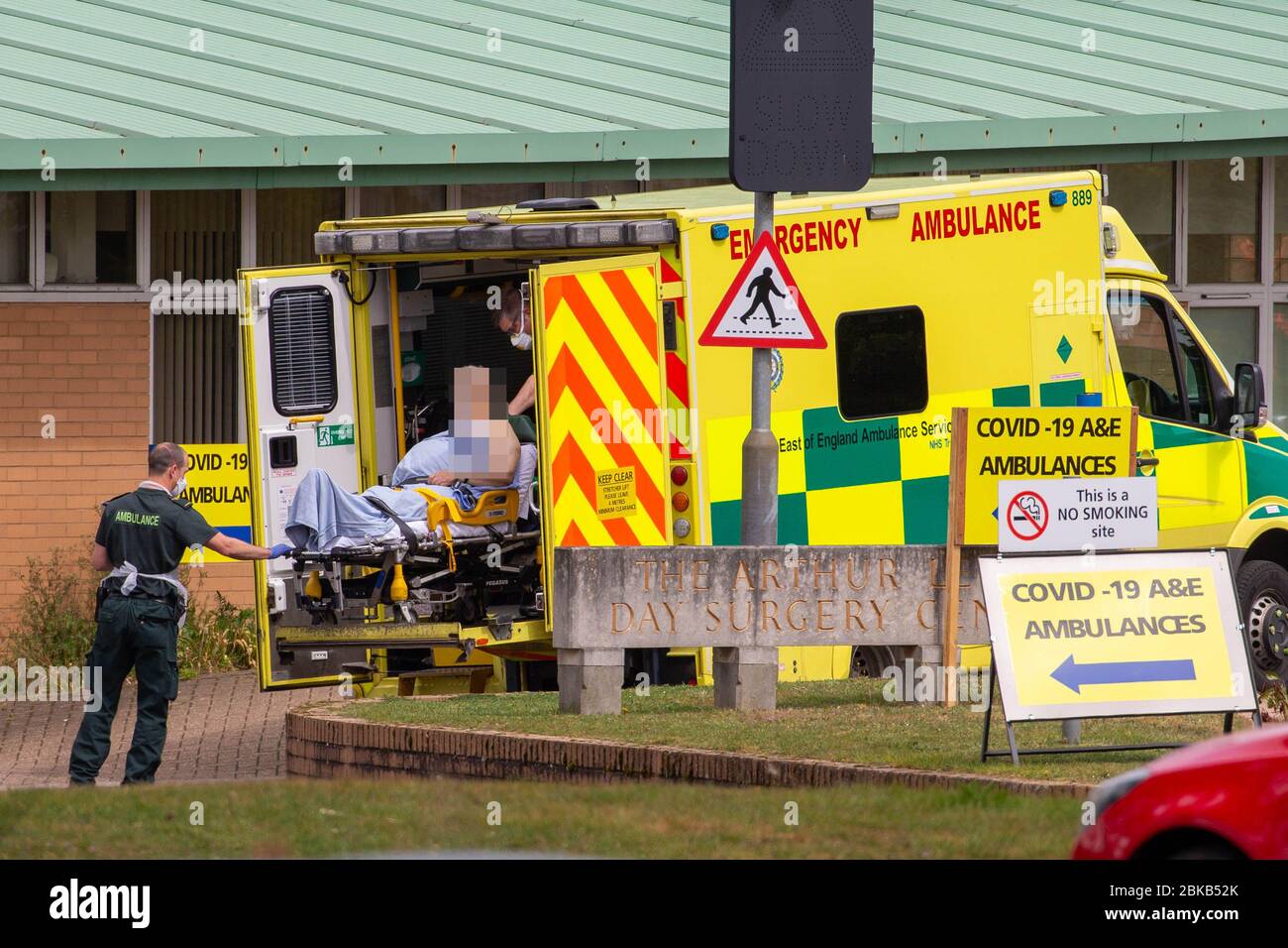 Picture dated April 29th shows ambulance crews taking in patients to the Covid-19 ward  at the Queen Elizabeth Hospital  in KingÕs Lynn in Norfolk on Wednesday afternoon.  Ambulance drivers were today (Wed) seen delivering patients with suspected coronavirus into the hospital close to the QueenÕs Norfolk estate C where Prince William and Kate are currently staying with their children.  NHS staff were seen pushing the patients on trollies into the Queen Elizabeth Hospital (QEH) in KingÕs Lynn, which is just six miles from Sandringham, where the Royal couple are currently living at Anmer Hall wi Stock Photo