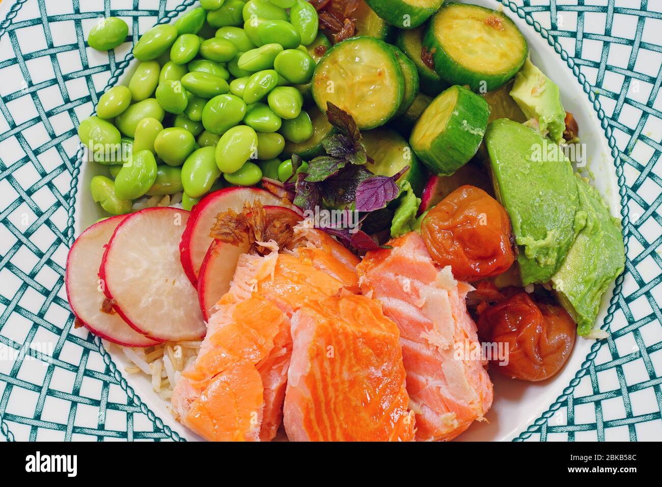 Rice bowl with salmon, edamame, cucumber and shiso Stock Photo Alamy