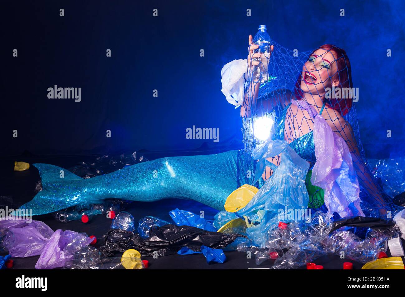 Ocean pollution, rubbish in the water. Stupid fairytale mermaid in dirty  ocean. Plastic trash and garbage in water. Environmental problem, plastic  bag Stock Photo - Alamy