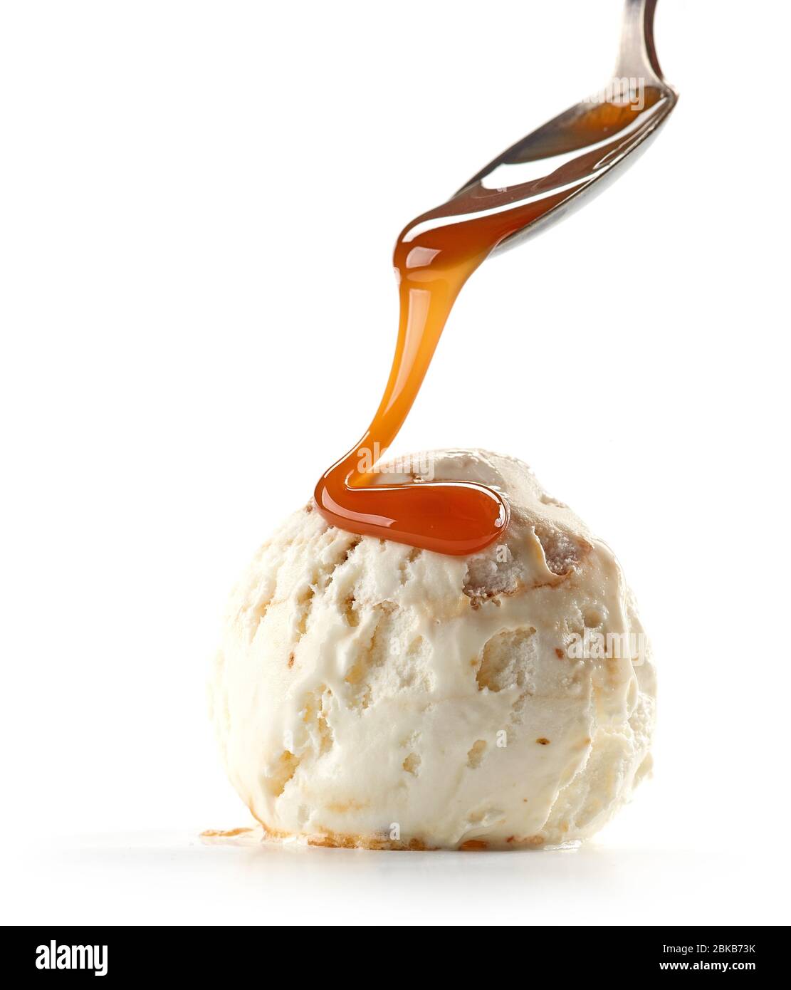ice cream with caramel sauce isolated on white background Stock Photo ...