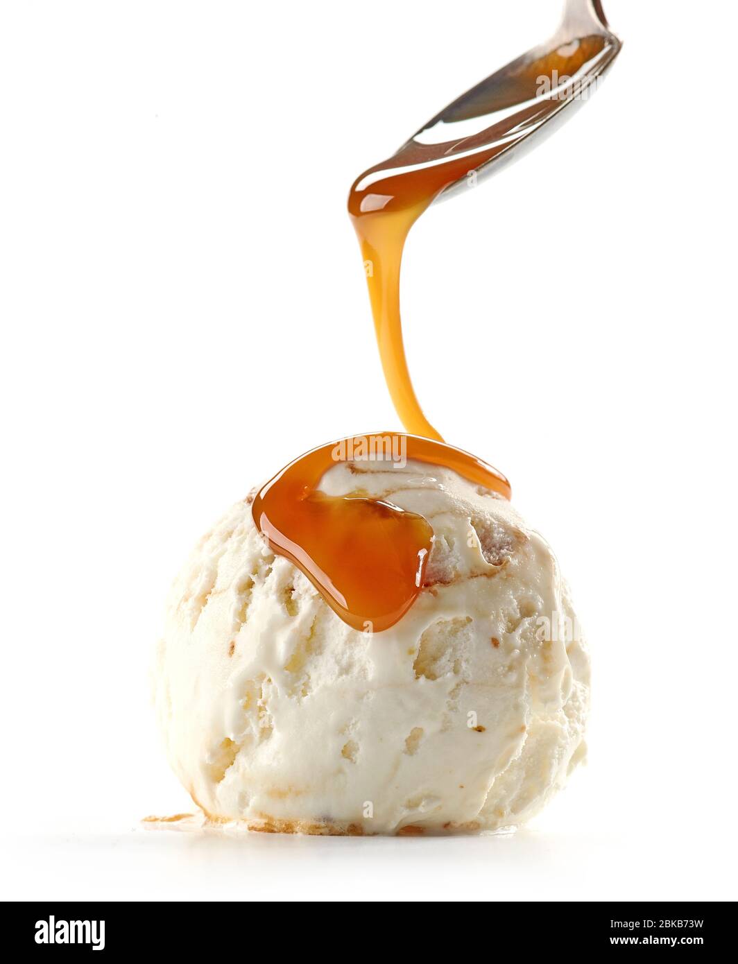 ice cream with caramel sauce isolated on white background Stock Photo ...