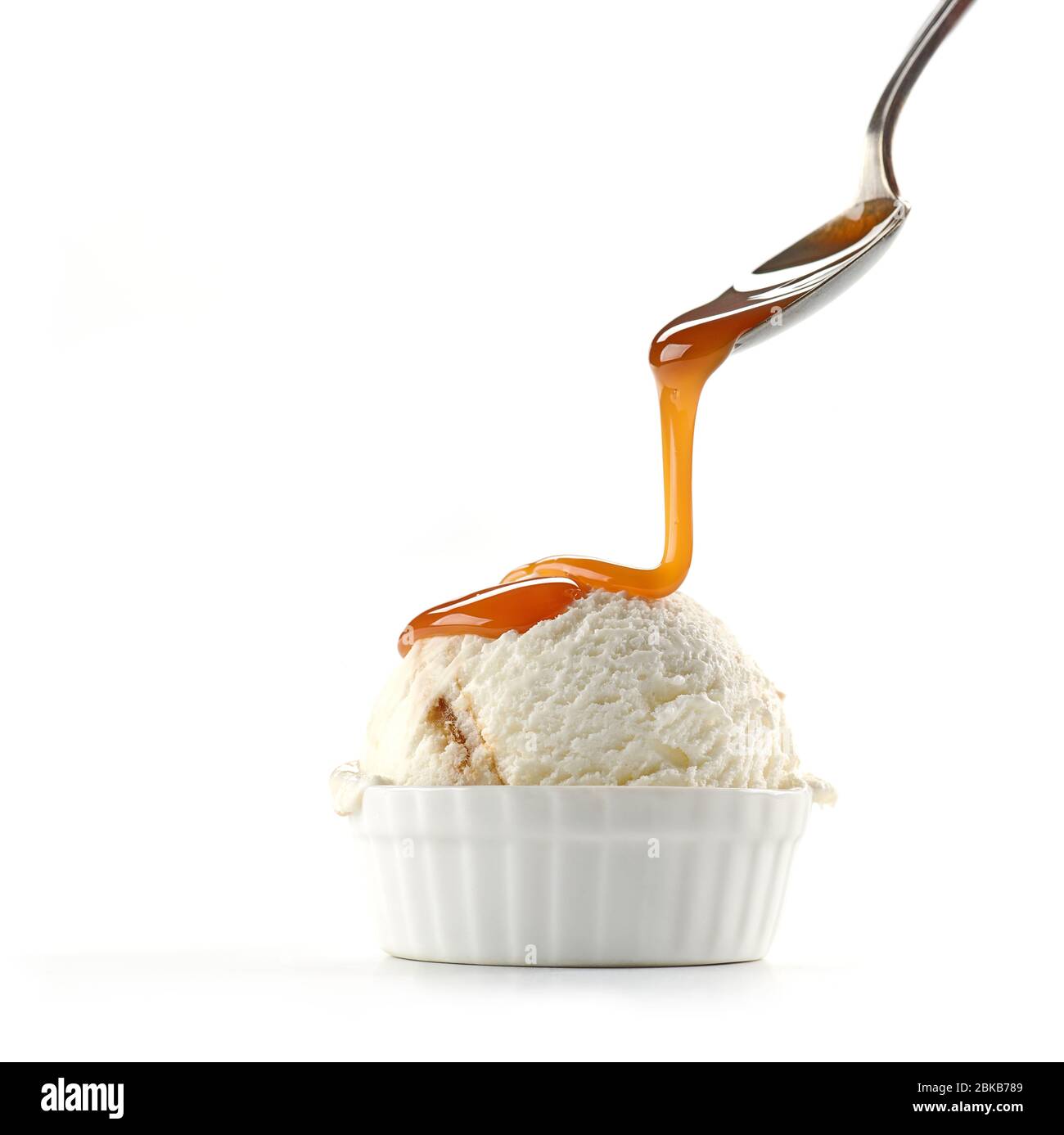 ice cream with caramel sauce isolated on white background Stock Photo ...