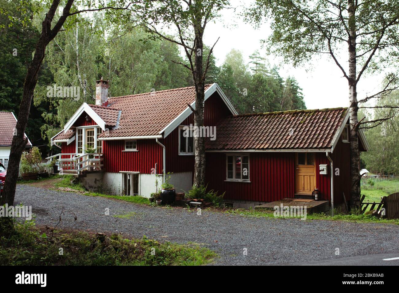 Sunrise old red wooden house hi-res stock photography and images - Alamy