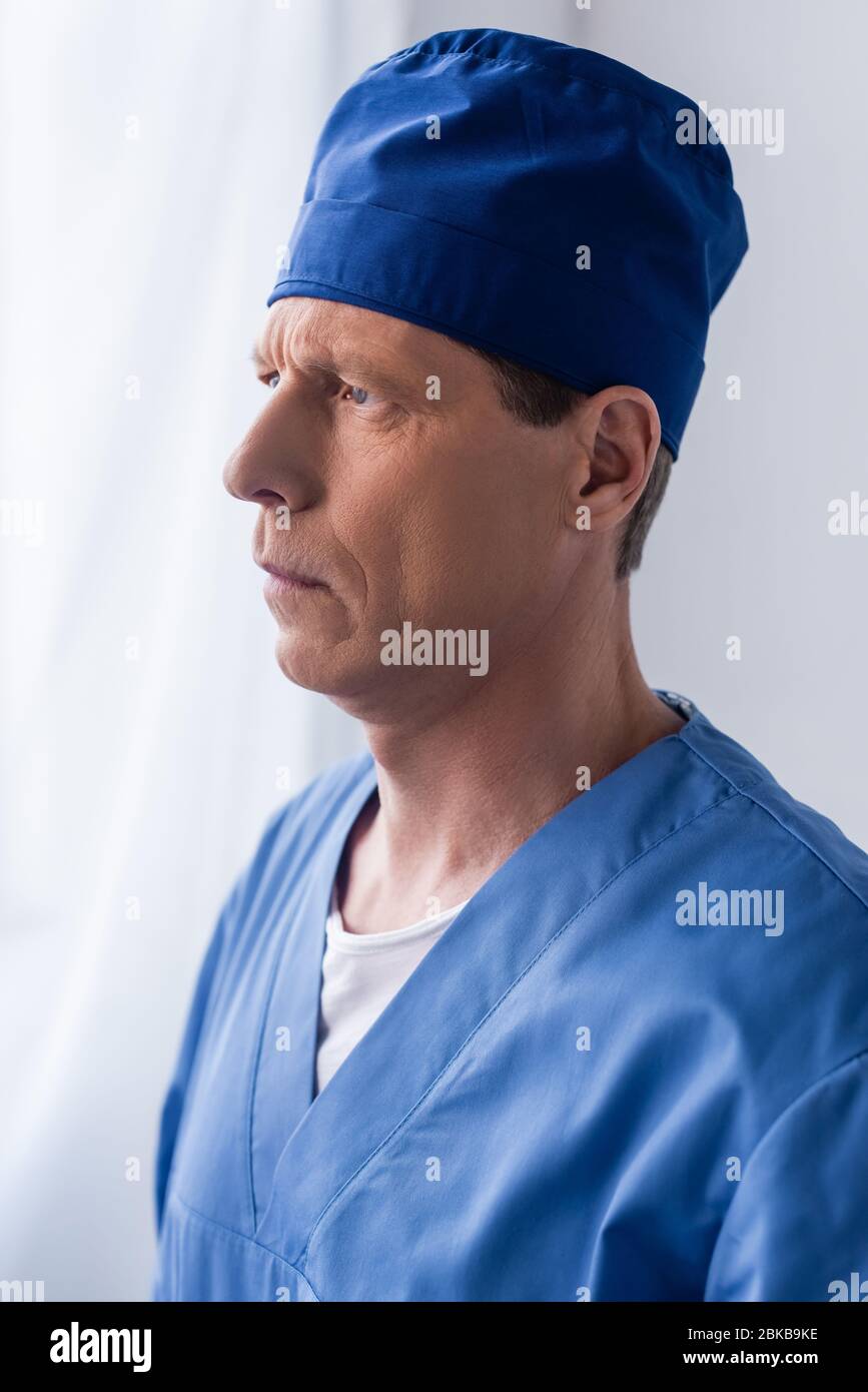 Pensive middle aged doctor hi-res stock photography and images - Alamy
