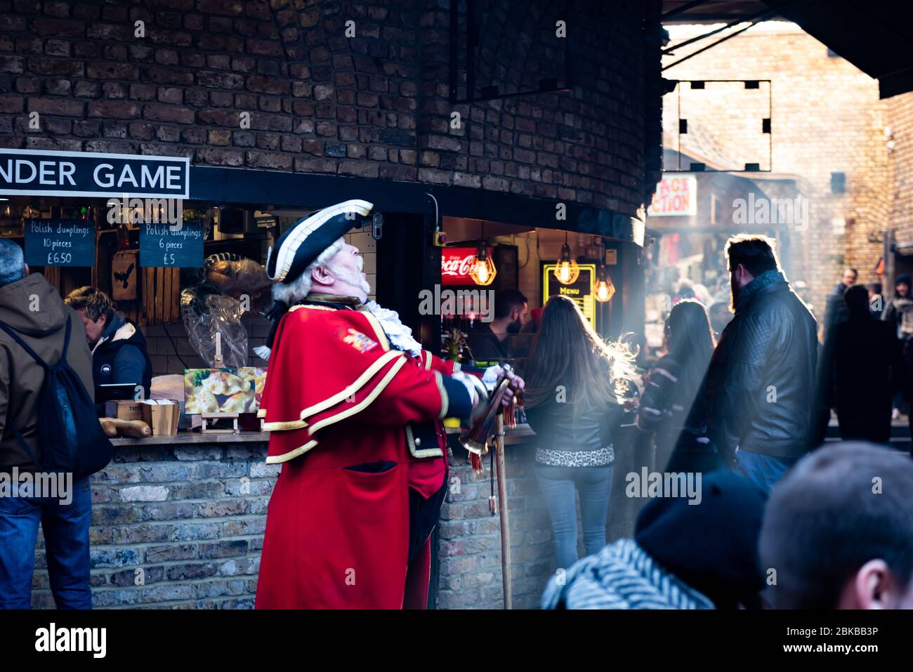 Spectacular sunlight and Guinness Record holder Alan Myatt the Town Crier in Camden Market in London England Stock Photo