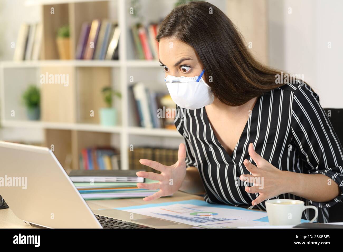 Reading Computer Amazed Amazed entrepreneur woman reading surprising news on laptop sitting on ...