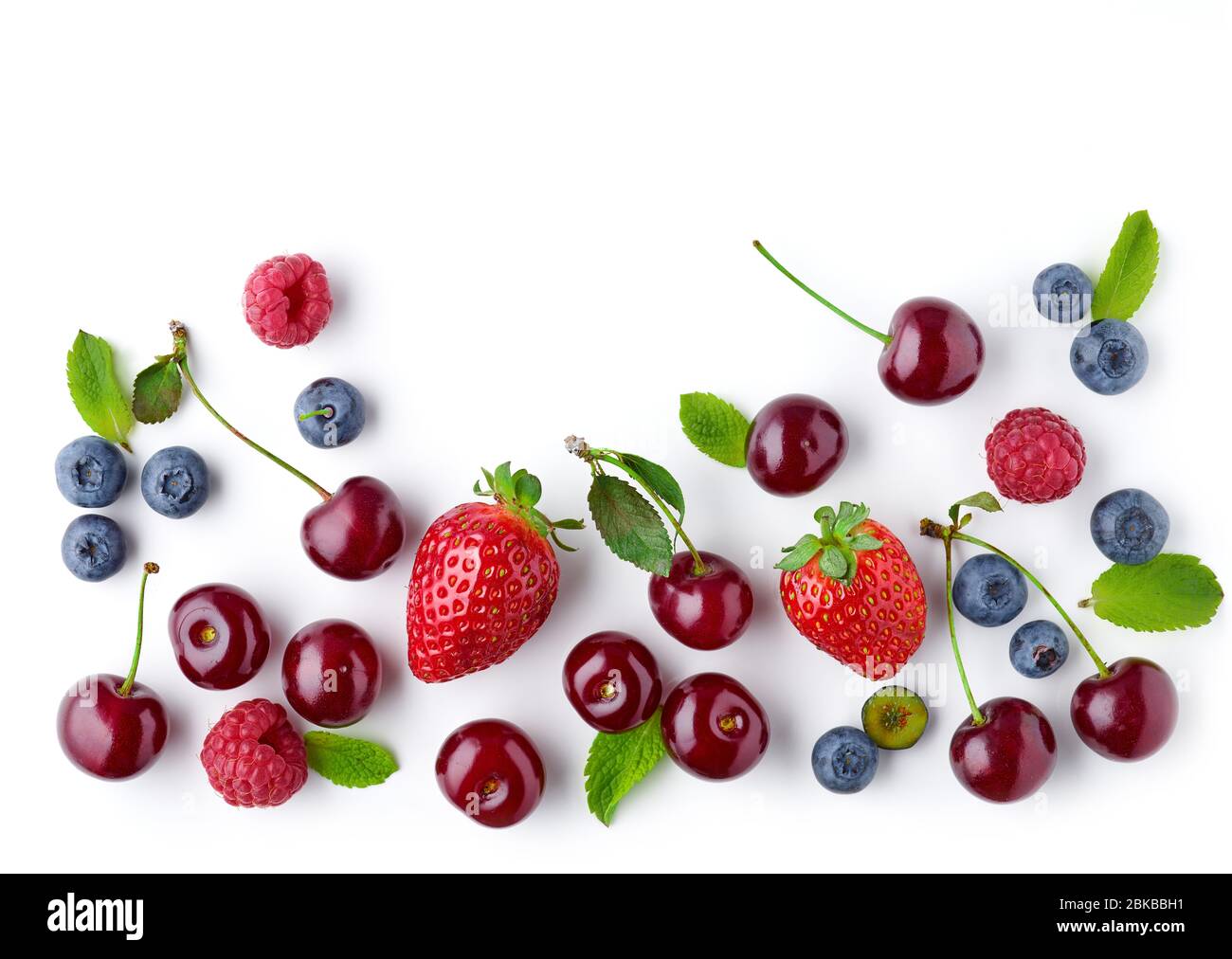 fresh berries isolated on white background, top view Stock Photo - Alamy