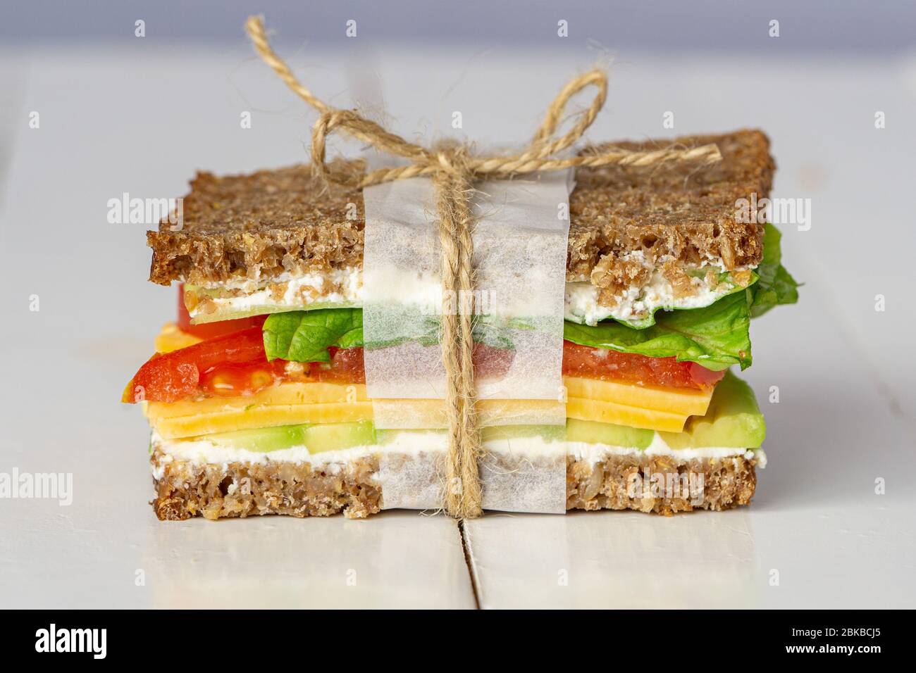 Vegetarian club sandwich with avocado. Healthy lunch, breakfast. Stock Photo