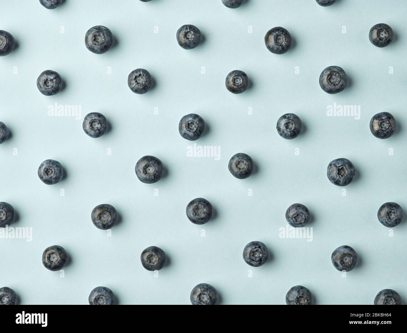 blueberry pattern on blue background, top view Stock Photo