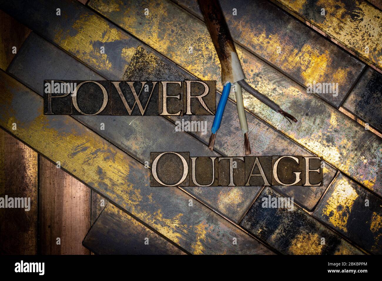 Photo Of Real Authentic Typeset Letters Power Outage Text On Vintage Textured Grunge Copper And Gold Background Stock Photo Alamy