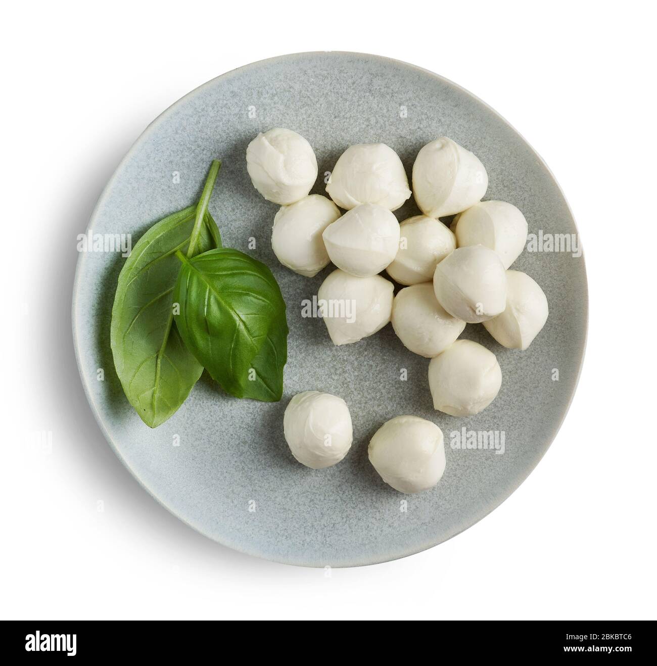 plate of mozzarella cheese balls isolated on white background, top view Stock Photo