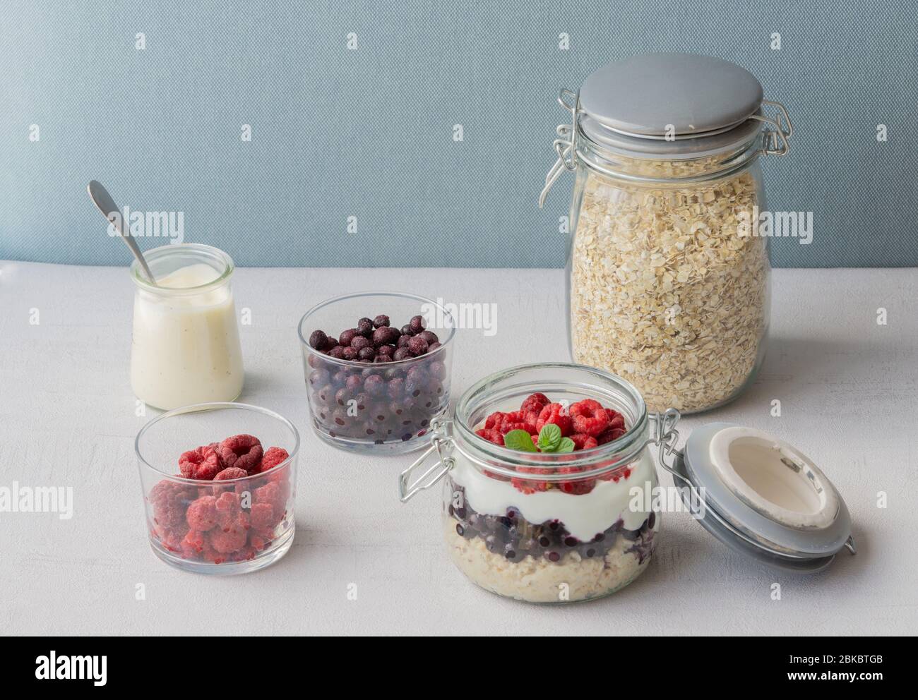 Overnight oatmeal in a jar. Healthy vegetarian breakfast. Stock Photo