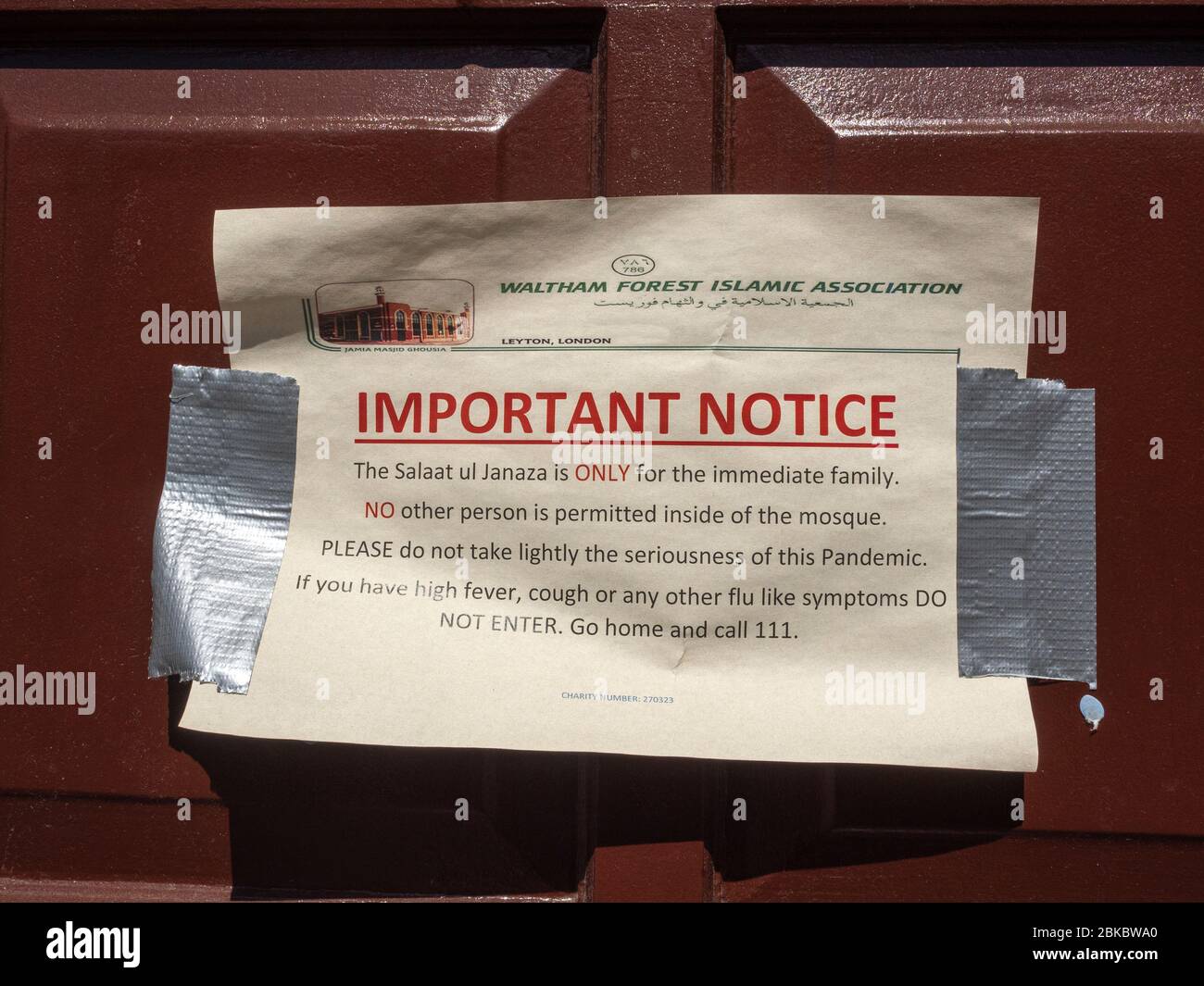 Leyton. London. UK. May the 2nd, 2020. Close-up of warming Funeral notice at “Jamia Masjid Ghousia Mosque” during the outbreak. In the note “Salaat ul Stock Photo