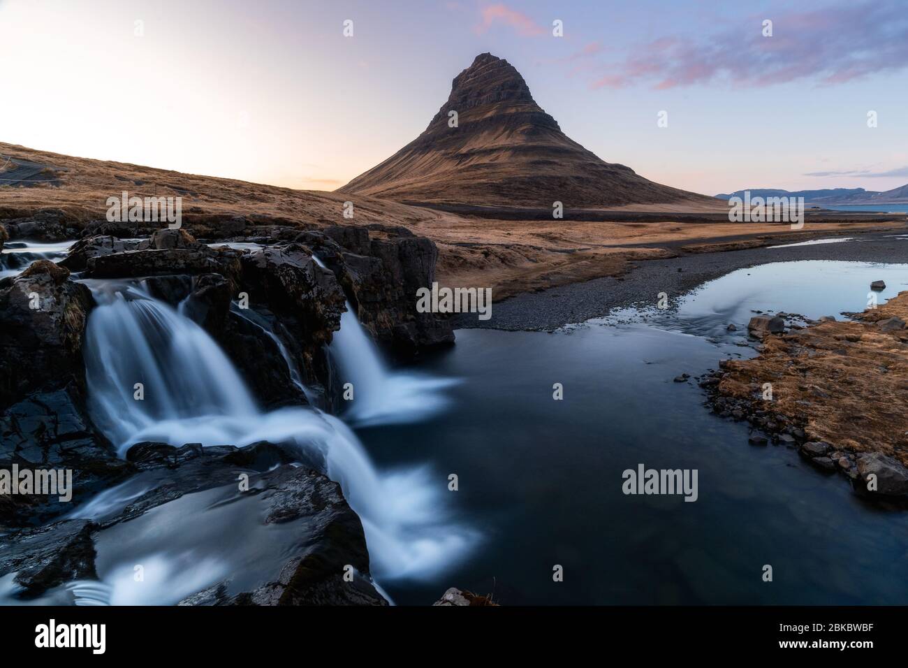 Kirkjufell is one of the most scenic and photographed mountains in Iceland all year around. Beautiful Icelandic landscape of Scandinavia Stock Photo