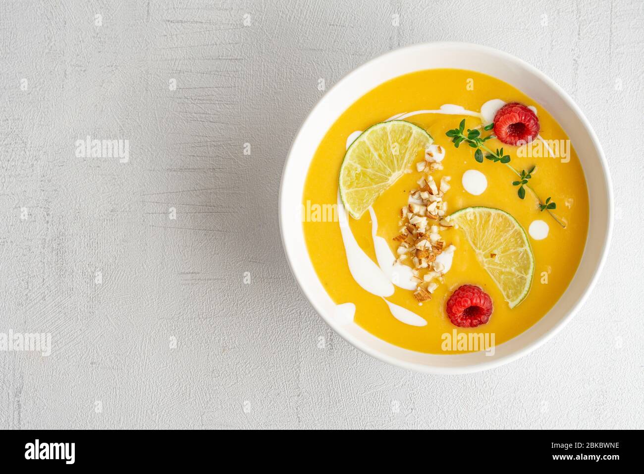 Pumpkin cream soup. Isolated. Copy space. Vegetarian, healthy food. Stock Photo