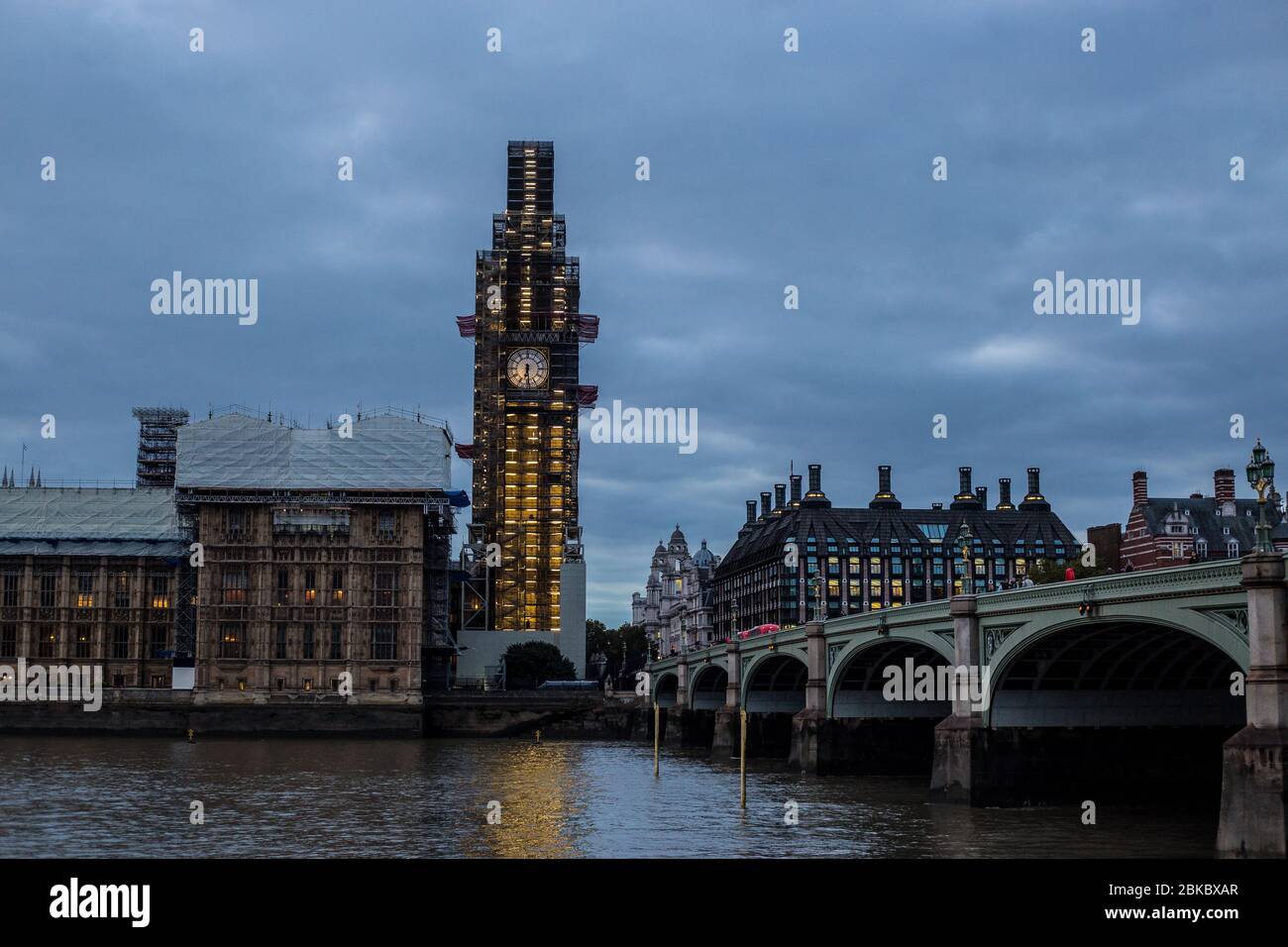 London, UK - October 8, 2018: View of Big Ben under Construction and Houses of Parliament at Sunset Stock Photo