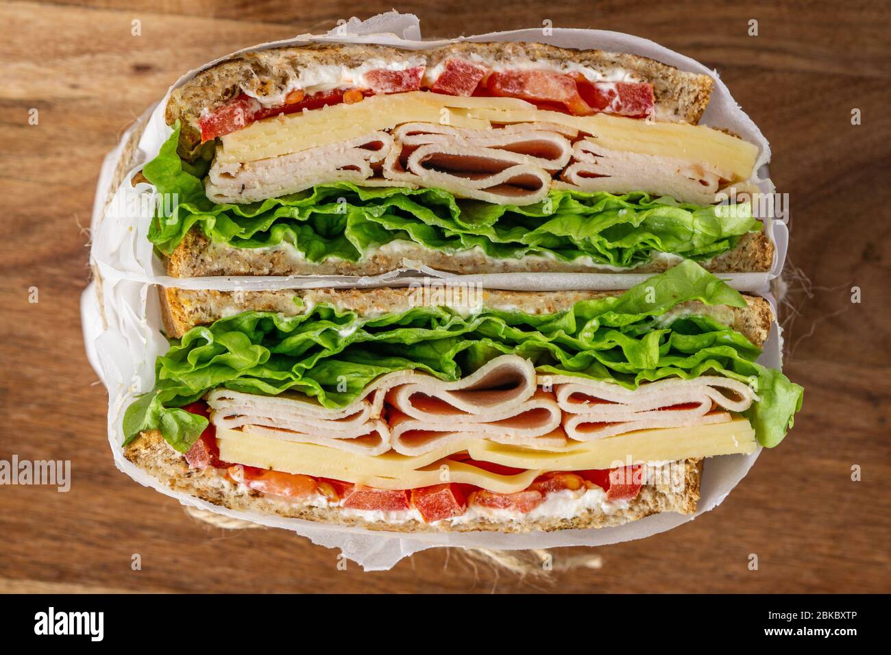 Club sandwich close up. Homemade lunch, breakfast or take away food. Stock Photo