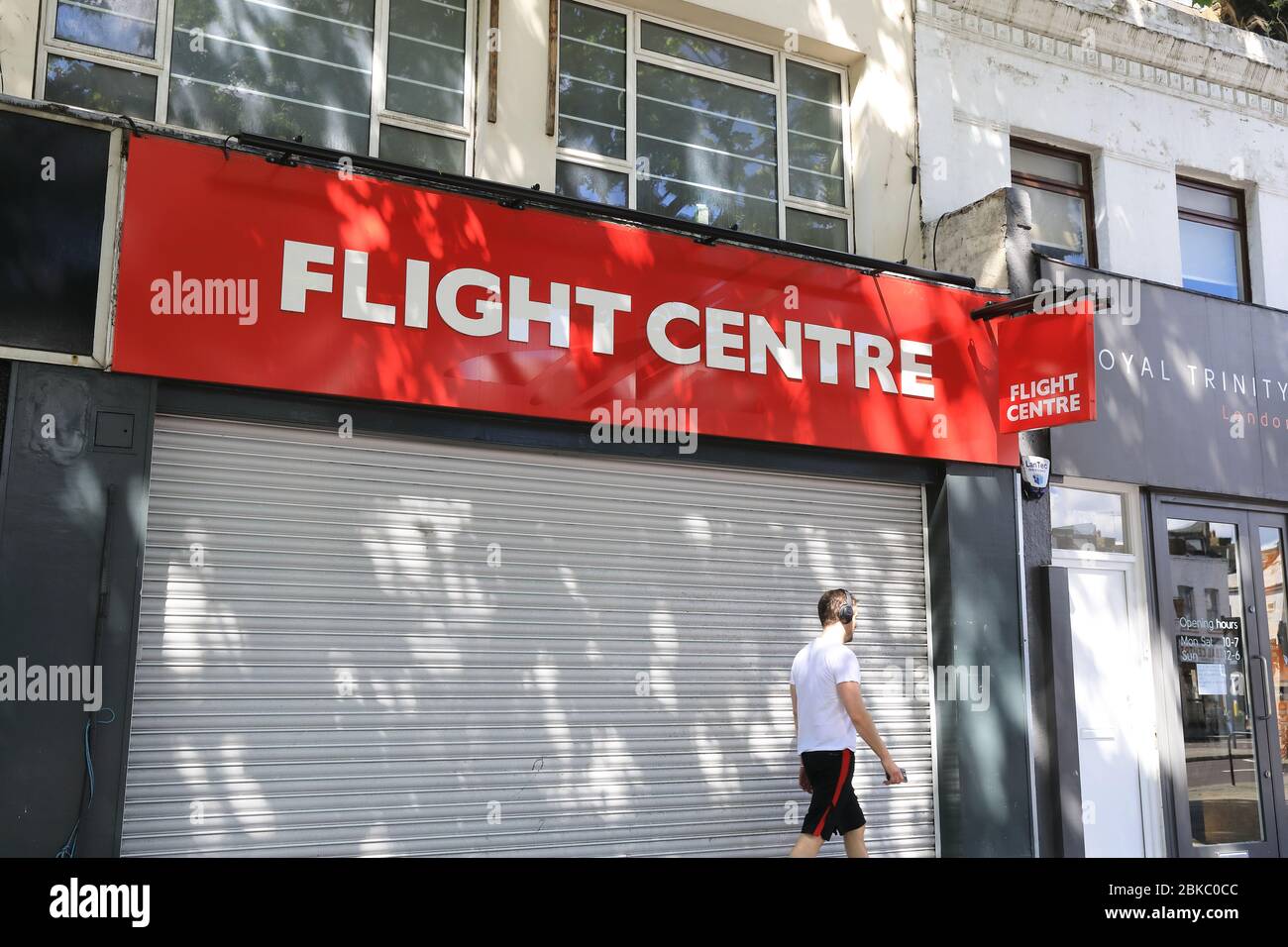 Flight shops closed during the tight travel restrictions, on Upper Street, Islington, during the coronavirus pandemic lockdown, in London, UK Stock Photo