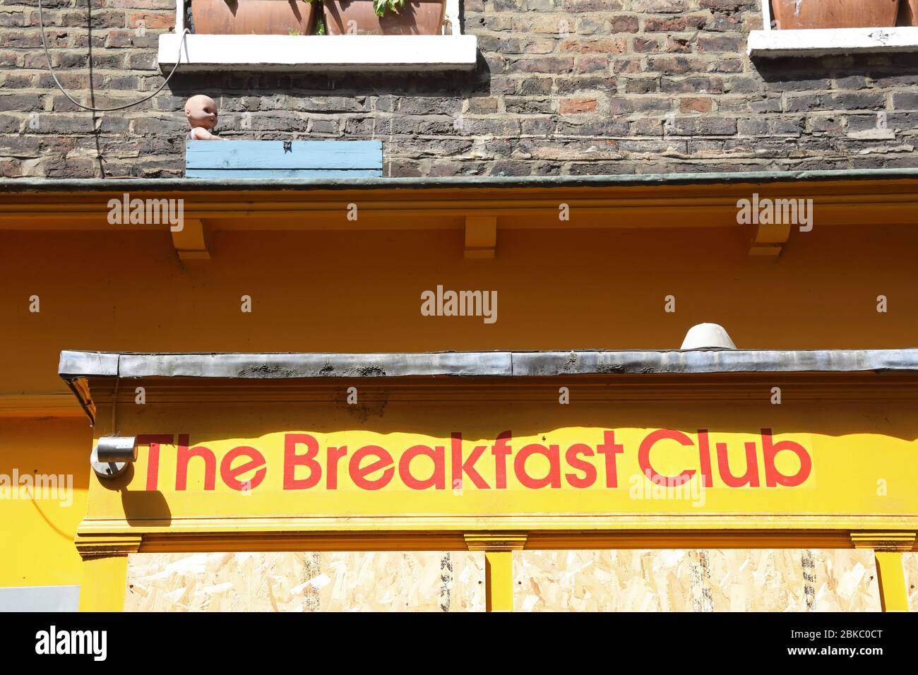 The usually popular Breakfast Club cafe on Camden Passage, boarded up, in Islington, north London, boarded up during the coronavirus pandemic lockdown, UK Stock Photo