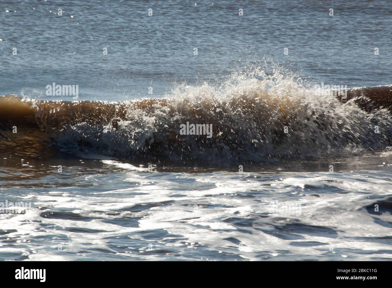 Ocean waves breaking at the beach Stock Photo - Alamy
