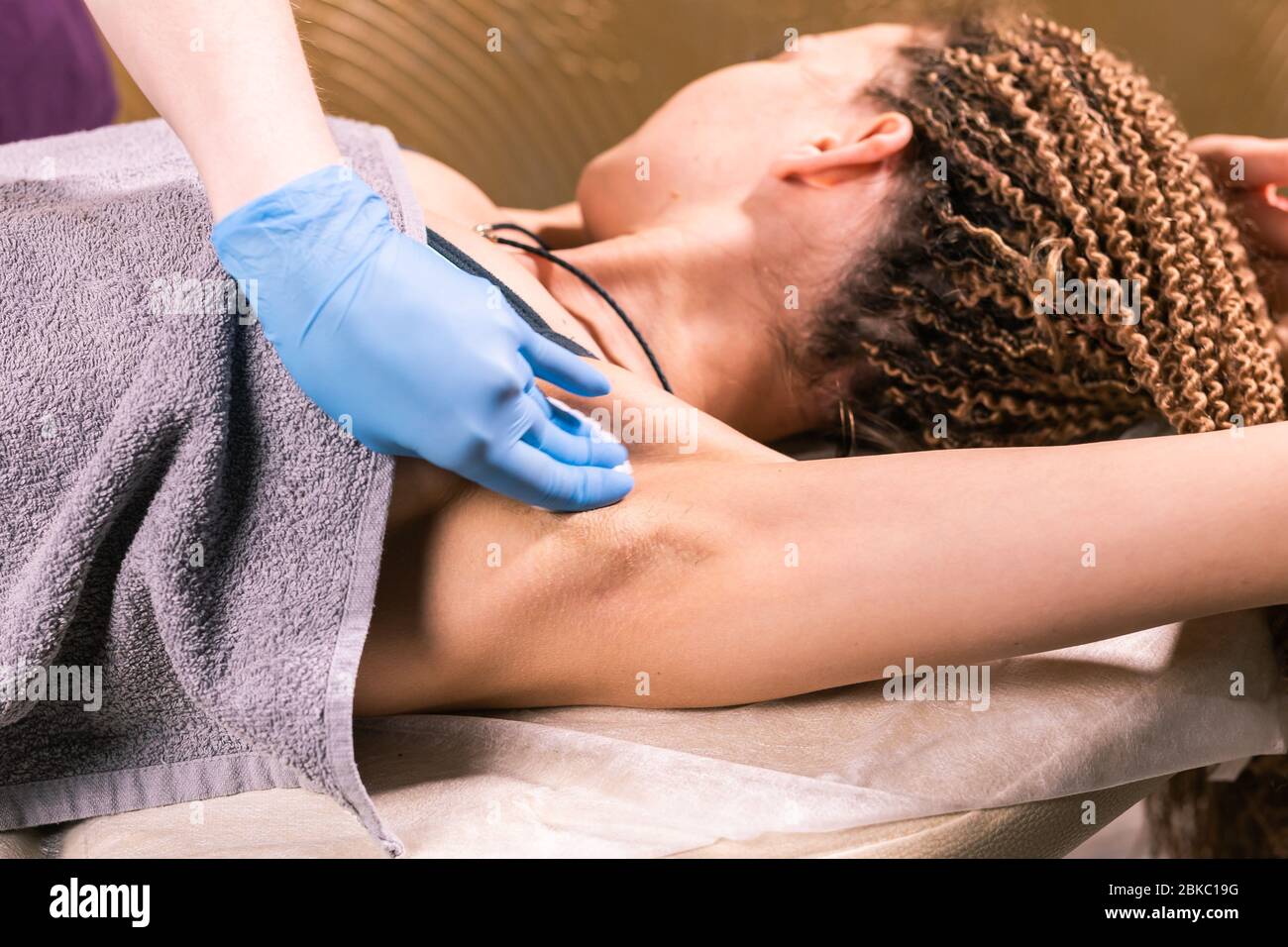 Waxing woman armpit. Salon wax beautician epilation procedure. Waxing female  body for hair removal by therapist close up. Smooth underarm concept Stock  Photo - Alamy