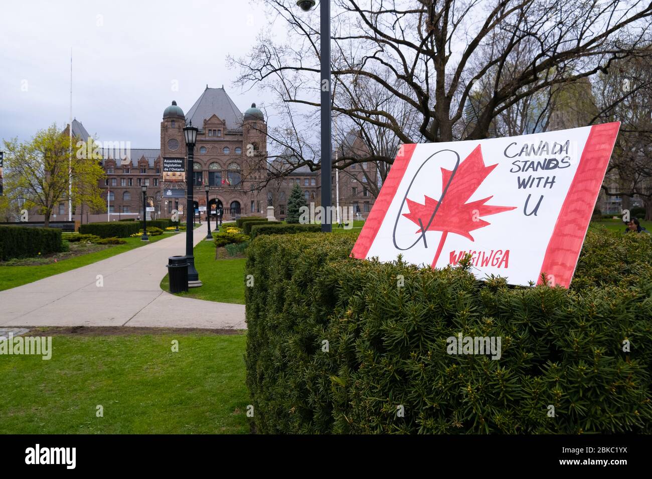 A QAnon sign placed near the Ontario Legislative Building in Queen's Park, Toronto, during a protest to end the COVID-19 shutdown. Stock Photo