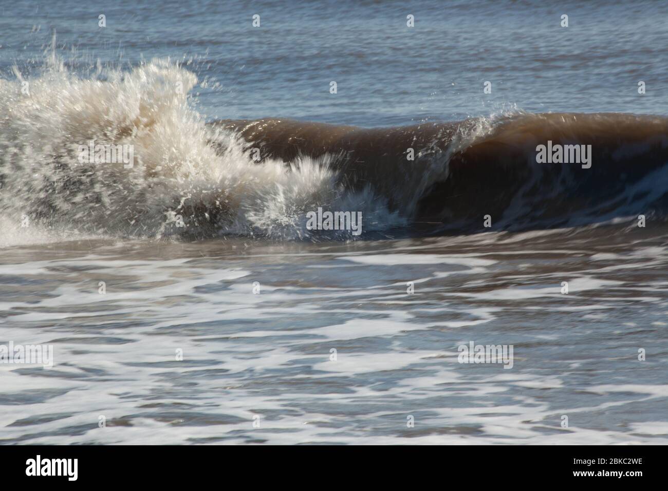 Ocean waves breaking at the beach Stock Photo - Alamy