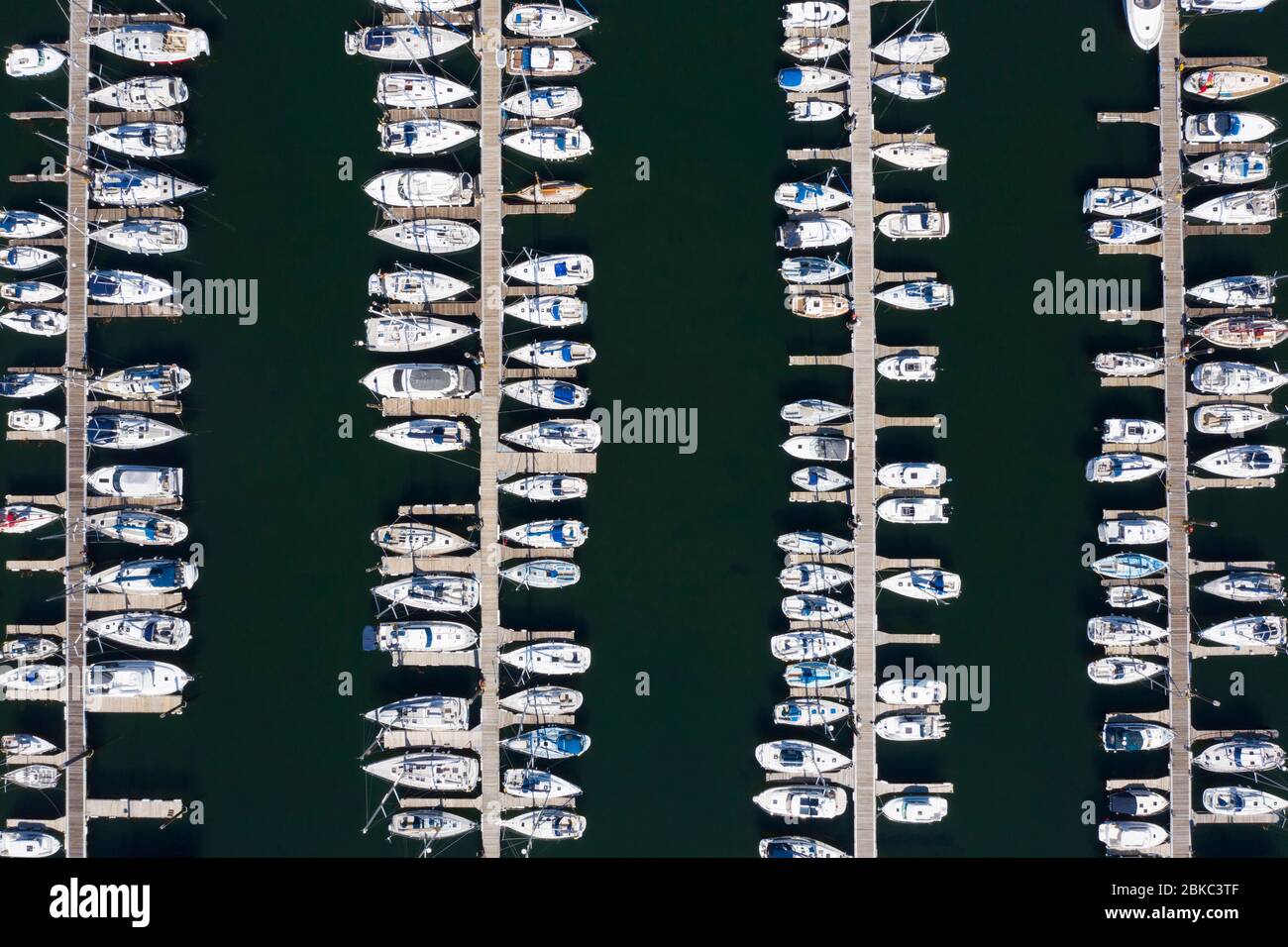 Largs, Scotland, UK. 4 May 2020. Aerial view of Largs Yacht Haven which is very busy with almost all berths being filled with yachts. Normally many yachts would be out sailing at this time of year but are now forced to remain at the harbour during the coronavirus lockdown. Iain Masterton/Alamy Live News Stock Photo