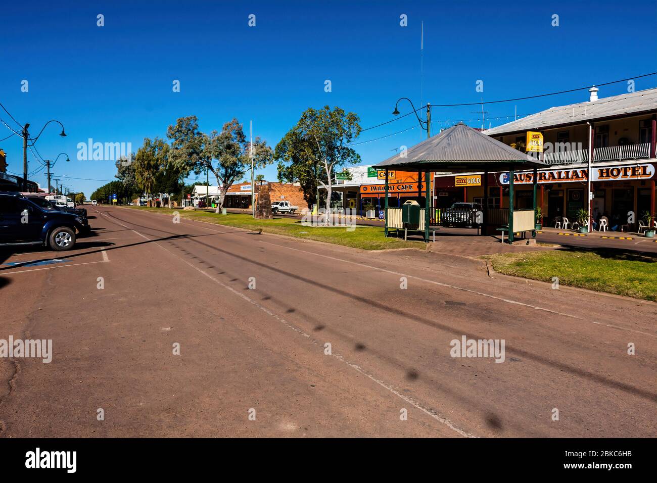 Local businesses and parked cars on Elderslie Street, Winton, Australia