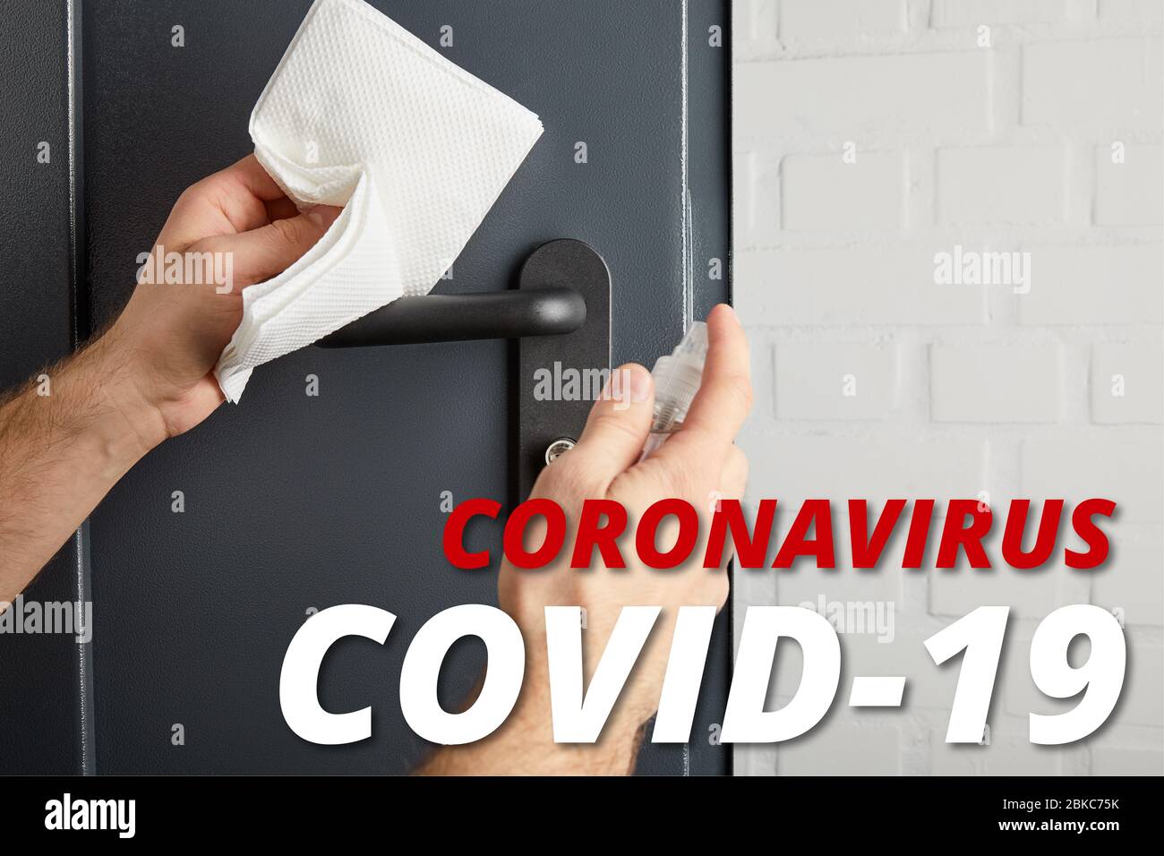 partial view of man disinfecting metal door handle with antiseptic and napkin, coronavirus