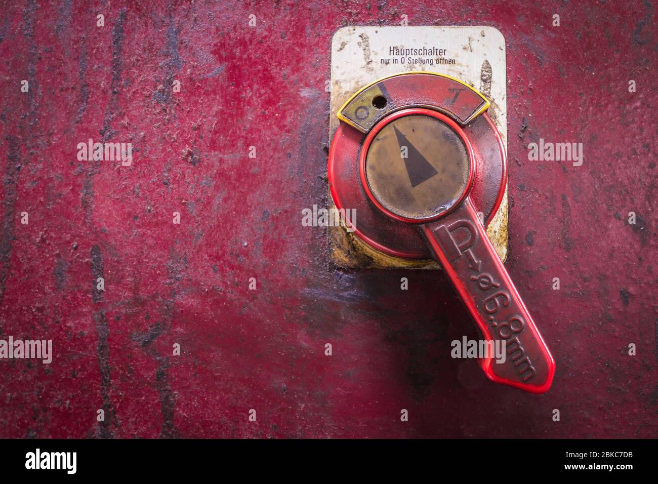 mains switch of a historic machine Stock Photo