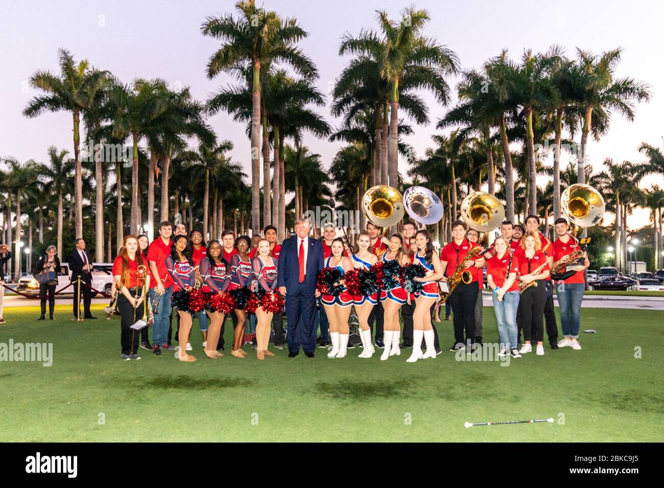 President Donald J. Trump poses for a photo with members of the Florida Atlantic University marching band Sunday evening, Feb. 2, 2020, outside the Trump International Golf Club in West Palm Beach, Fla., prior to attending a Super Bowl party. President Trump and First Lady Melania Trump in Florida Stock Photo