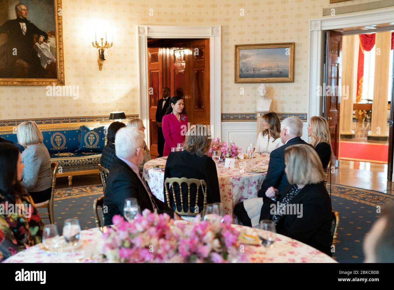 First Lady Melania Trump listens as Mrs. Yumi Hogan, wife of Maryland Governor Larry Hogan and the Chair of the Spouses Leadership Committee, speaks during a Luncheon for Governors’ Spouses Monday, Feb. 10, 2020, in the Blue Room of the White House. President Trump and First Lady Melania Trump at the Governor's Ball Stock Photo