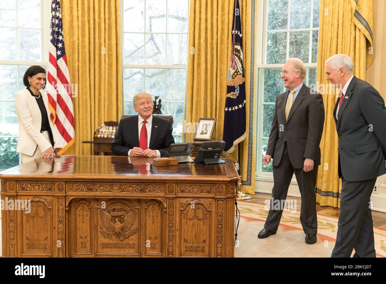 President Donald J. Trump shares a laugh with (clockwise from left) Ms.Seema Verma, Administrator of the Centers for Medicare and Medicaid Services, Secretary Tom Price, U.S. Secretary of Health and Human Services, and Vice President Mike Pence on Tuesday, March 14, 2017, in the Oval Office of the White House. Ms. Verma was sworn in as the Administrator earlier in the afternoon by Vice President Pence. Photo of the Day: 3/15/17 Stock Photo