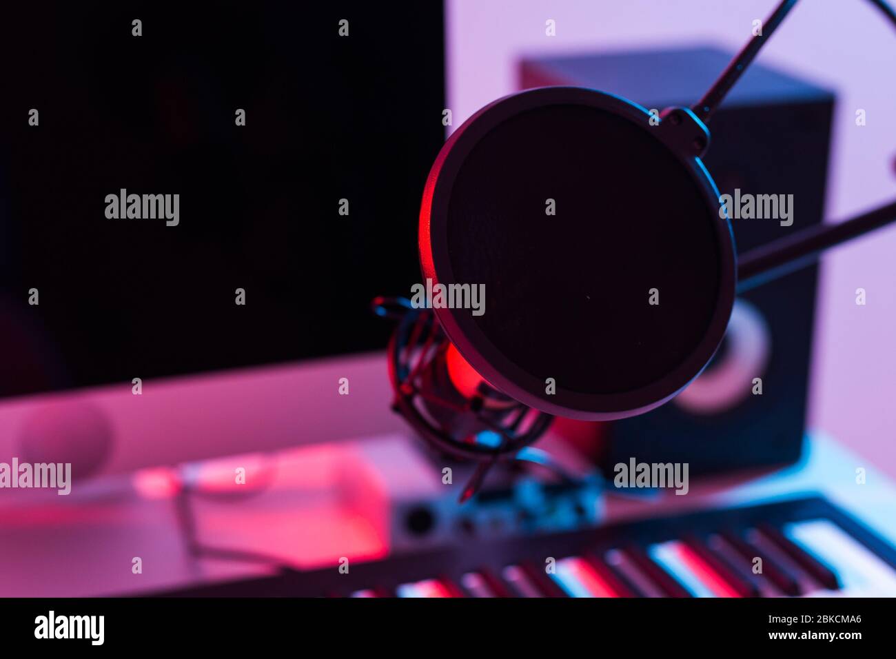 Music recording set with a microphone, keyboard, mouse and laptop. Internet  musician r influencer set Stock Photo - Alamy