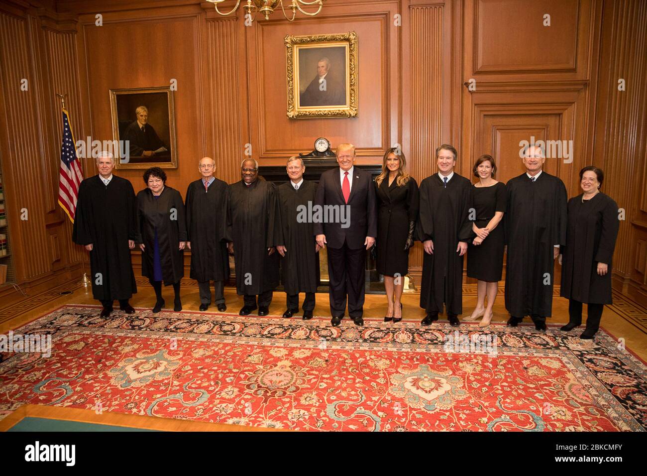 President Donald Trump and First Lady Melania Trump greet Supreme Court Justices at the Supreme Court of the United States in Washington, D.C., on November 8, 2018, as part of a formal event. Stock Photo