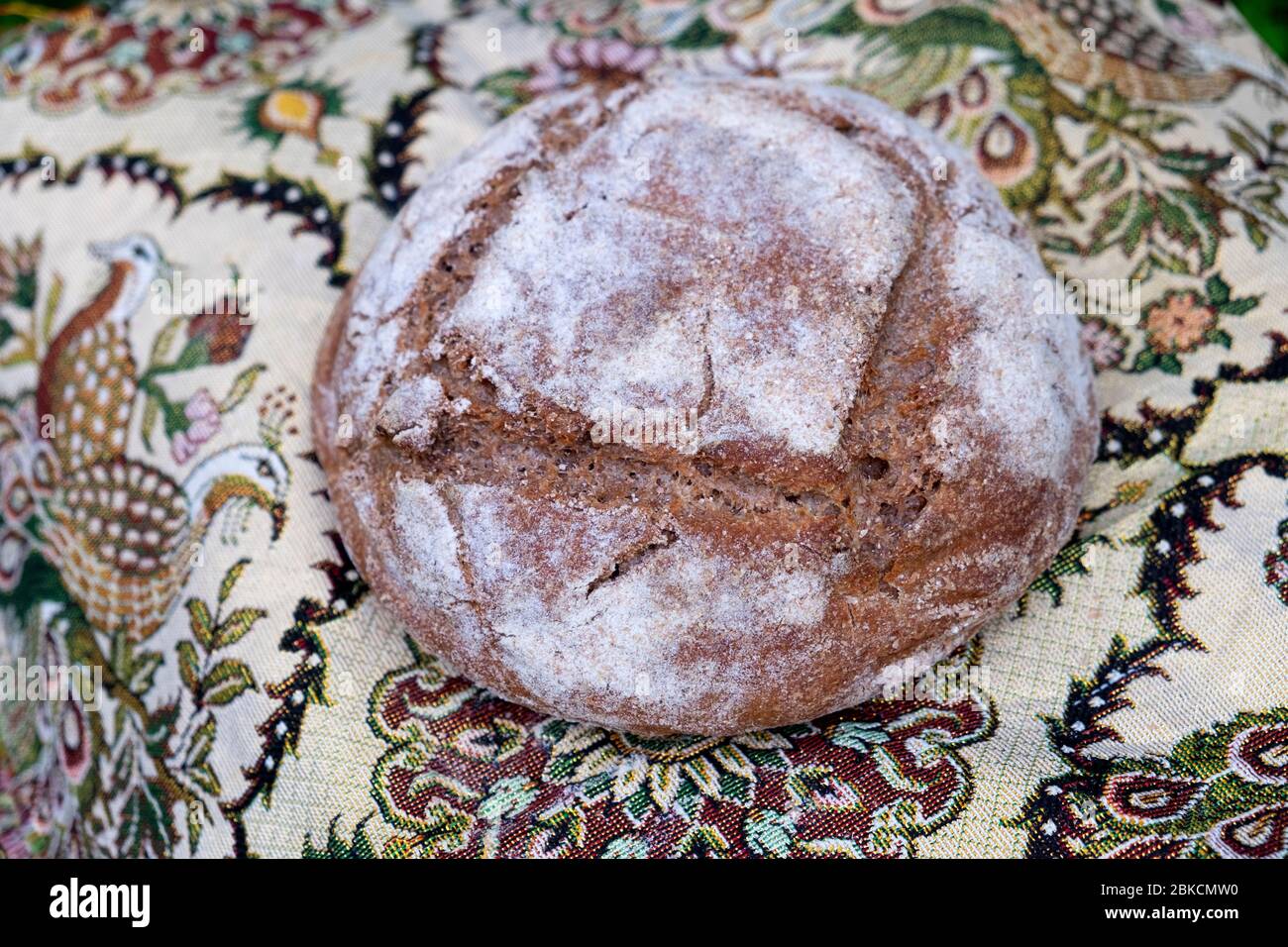 A freshly baked homemade loaf of rye & whole wheat sourdough bread view from above made during Covid 19 Coronavirus outbreak pandemic UK KATHY DEWITT Stock Photo
