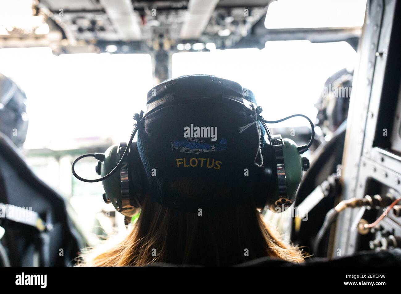 First Lady Melania Trump wears a USS George H.W. Bush hat embroidered with FLOTUS following a holiday visit aboard the aircraft carrier Wednesday, Dec. 12, 2018, en route to Joint Base Andrews, MD. First Lady Melania Trump Visits the USS George H.W. Bush Stock Photo