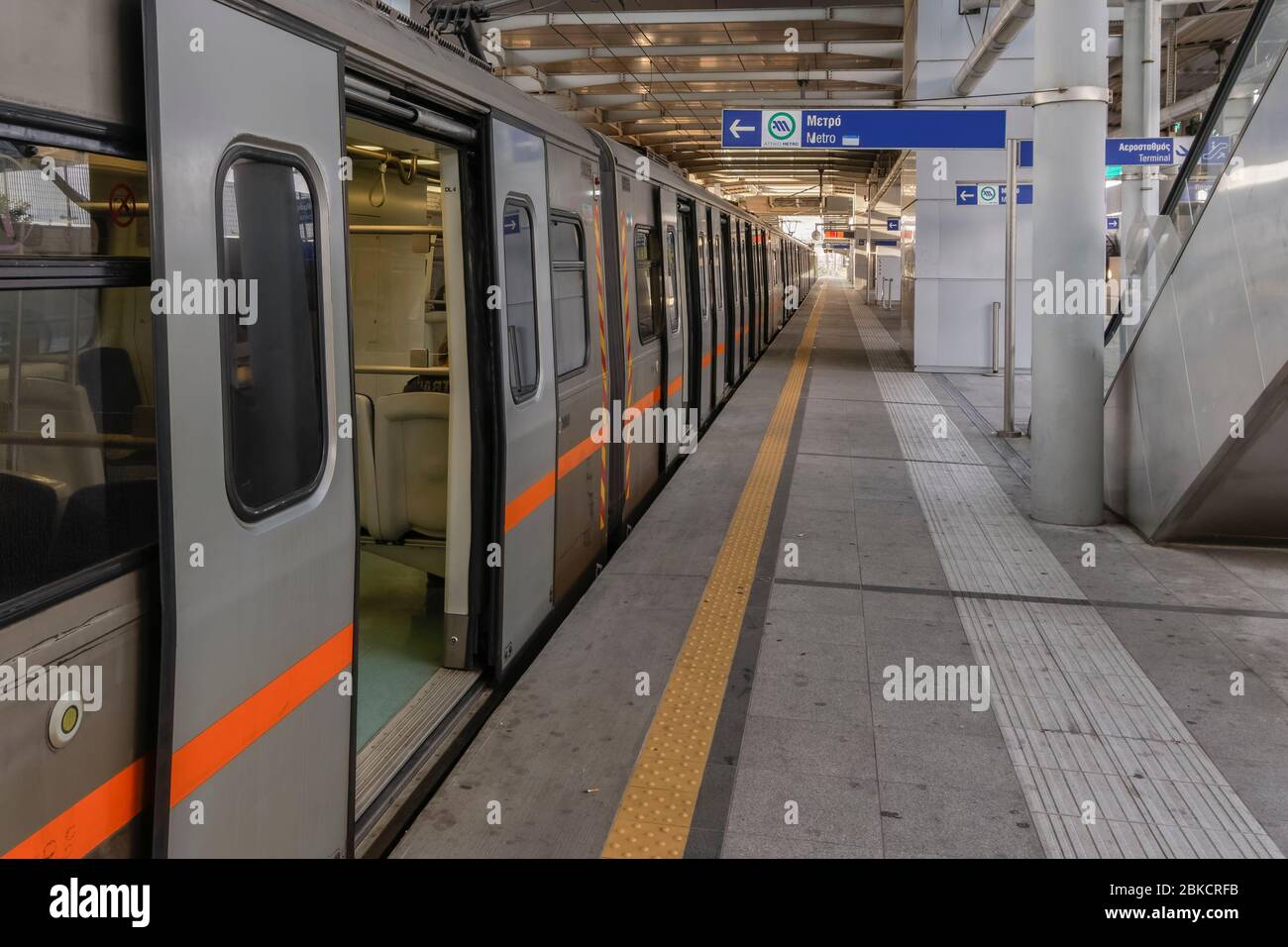 Athens, Greece empty metro train stopped at station. Coach without  passengers with open doors on track at Eleftherios Venizelos International  Airport Stock Photo - Alamy